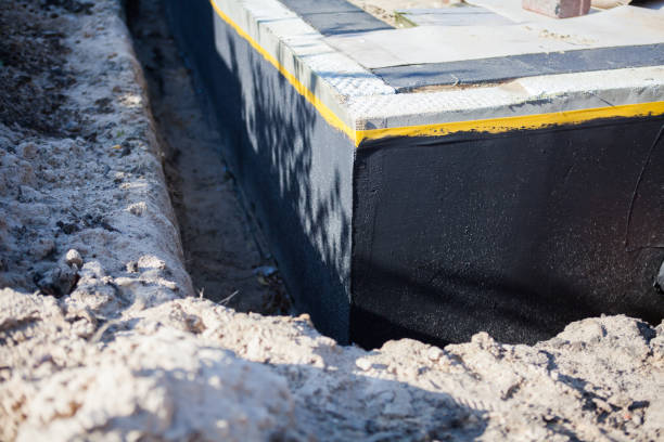 Professional Emergency Waterproofing technician working in Stevens Point, WI